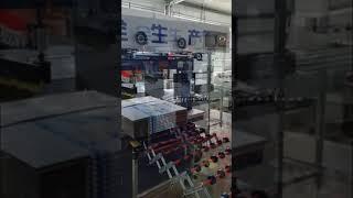Automatic carton strapping machine