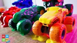 Colorful Monster Trucks Take A Dip In Paint