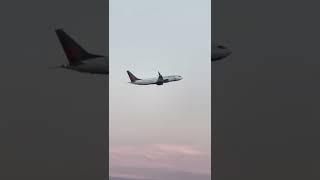 Air Canada jet vs the cotton candy pink skies over Toronto - Sunset departure from YYZ