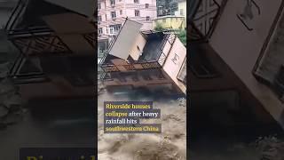 Riverside houses collapse after heavy rainfall hits southwestern China #shorts