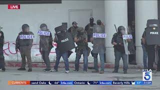 Protests erupt after dozens detained in sweeping Los Angeles ICE raids
