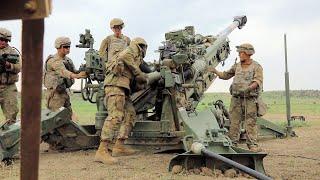 Soldiers Fire Howitzer At Fort Carson