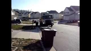 Labrie automizer right-hand garbage truck in the City of Greensboro N.C.