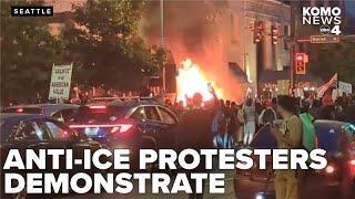 Anti-ICE protest in Seattle turns tense as fireworks, rocks thrown at police