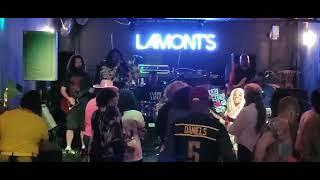 The Spotlight Band sings "Cancel Sam's Reservation " at Lamont's Entertainment Complex.