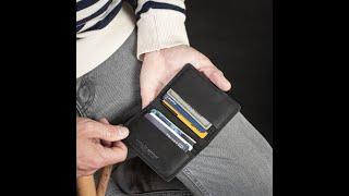 How much The Credit Card Wallet  Black Leather holds by Duvall Leatherwork