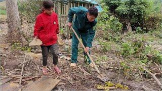 The uncle showed the girl how to plant more elephant grass in the vacant land to earn extra income.