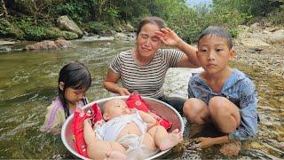 The process of harvesting and catching giant fish for 2 children to eat.