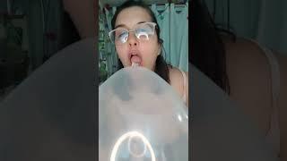 Getting lost in the fun of a fully inflated balloon! 