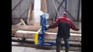 Russian mini bandsaw mill. 1 log for 9 minutes.