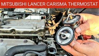 Mitsubishi Lancer, Carisma Thermostat Change. Thermostat Replacement Job. Car Engine Thermostat.