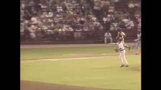 Bo Jackson breaking his bat over his helmet