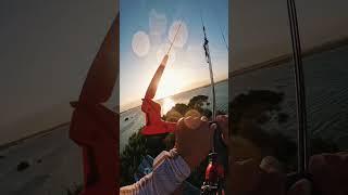 Action of a crazy man!  Flying with a kite!