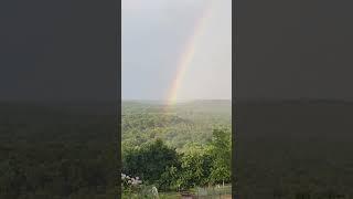 Gotta love it when the rainbow keeps landing in your yard! #ozarkschurchofnature