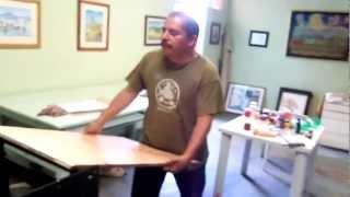 Jesus Victoriano Lopez Vega explaining his antique copy press demonstration.