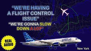 Flight control problem during climb. JetBlue Airbus A220 returns to New York Kennedy. Real ATC