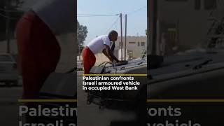 Palestinian confronts Israeli armoured vehicle in occupied West Bank | AJ #shorts
