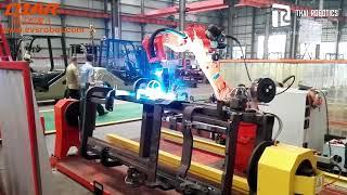 Robotics System for Folklift Shell Welding with Track and Positioner