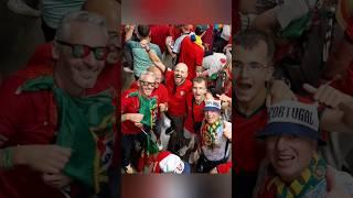  Portuguese fans at the EURO 2024, celebrating after qualifying for the next round 