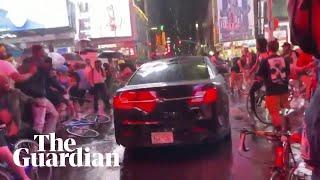 Car drives into Black Lives Matter protesters in New York's Times Square