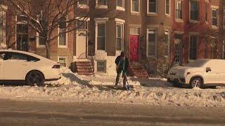 Some Baltimore City streets remain covered in snow as freezing temperatures continue