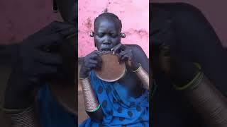 Ethiopian Surma Tribe Remove Lip Plate Before Bed":