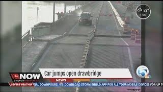 Car jumps open drawbridge