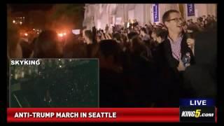 Anti Trump Rally Cameraman Stops Crowd From Lighting Trump Pence Sign On Fire