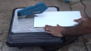 Demonstration of cutting a tile with a Erbauer ERB337TCB 750W Tile Saw 230V