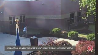 Medina police release surveillance video of armed suspect at sheriff's office before fatal shooting