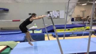 Kip on uneven bars (slow motion)