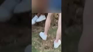 girl tramples a pine cone (candid trample)