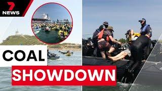 Climate change protesters arrested for blocking Australia's largest coal port | 7NEWS