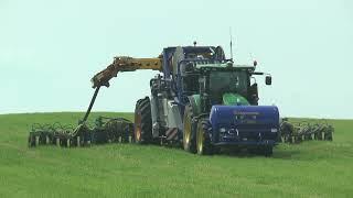 John Deere 7260R tractor pulling Agrometer SRS 1200 umbilical slurry injector in Germany