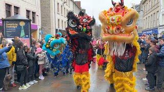 Chinese Lions lead parade through Perth City centre Scotland to celebrate Chinese New Year 2023