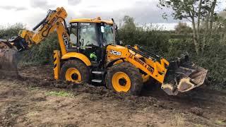 The stunning JCB 4CX with Engcon EC-Oil and stick steer