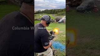 Shooting M134 Mini Gun from the hip.                              Columbia War Machine