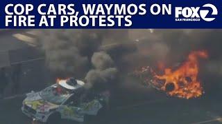 Waymos set on fire, cop cars vandalized in LA, San Francisco protests | KTVU