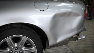 Repair of a damaged side panel on a Jaguar convertible with the Miracle-System.