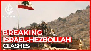 Hezbollah fighters battle Israeli troops on northern frontier