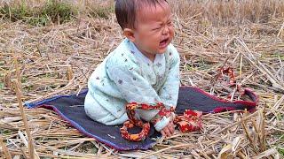 single mother goes to clear the land to grow spring peanuts/lytieusoa