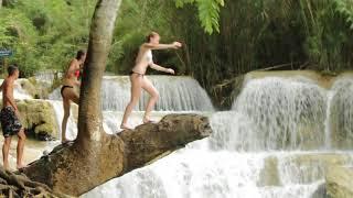 Girls From London Jumping into kuang si falls Waterfalls Luang Prabang Laos Travel