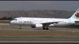 Vancouver Canucks/Air Canada Jetz Airbus 320 takes off from SJC