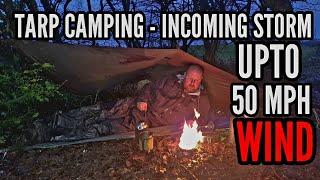 Tarp and bivvi camping in very strong wind and rain.