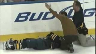 Niklas Hjalmarsson interferes and boards Jason Pominville from the blindside