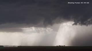 Shaft of sunlight illuminates Texas farm as storm approaches