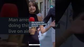 A man has been arrested after touching a reporter live on air #itvnews #spain