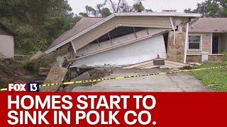 Dog alerts homeowners to sinking home in Polk County