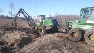 John Deere 1110D & John Deere 1470E stuck in mud