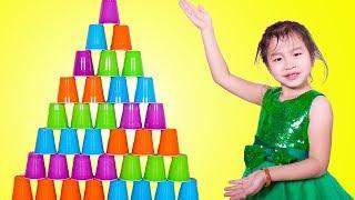 Jannie Stacking A HUGE Cup Pyramid